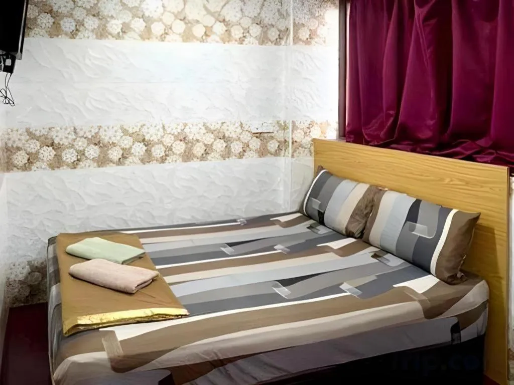 Bed in New Wave Hotel Melawati