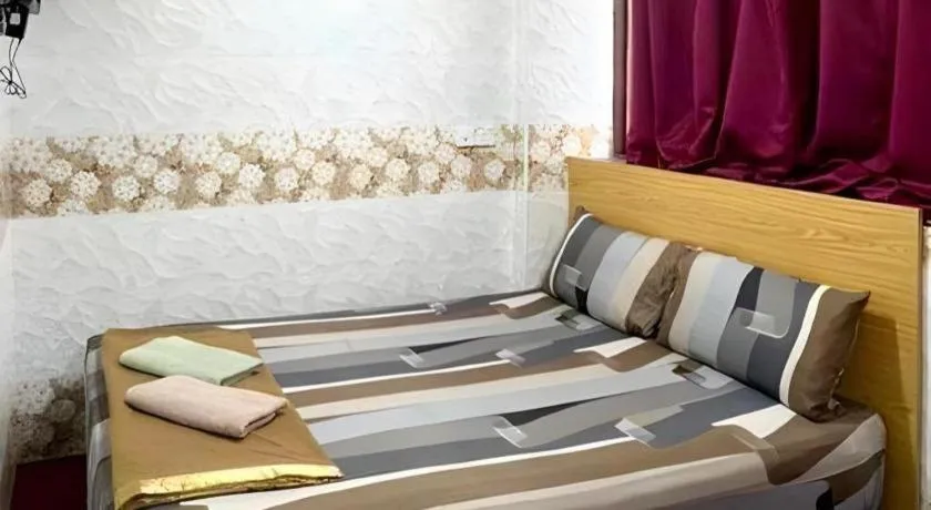 Bed in New Wave Hotel Melawati