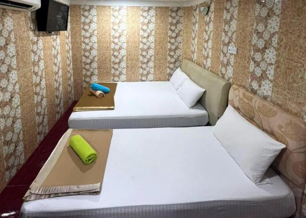 Bed in New Wave Hotel Melawati