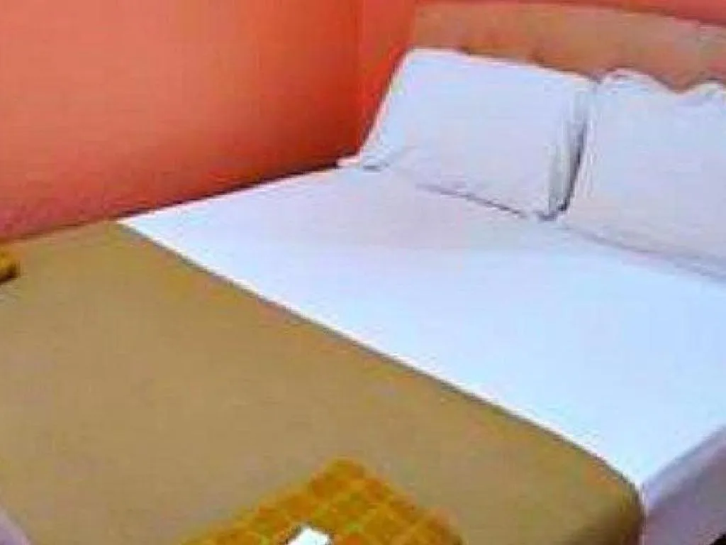 Bed in New Rawang Hotel