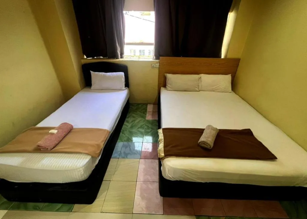 Bed in New Rawang Hotel