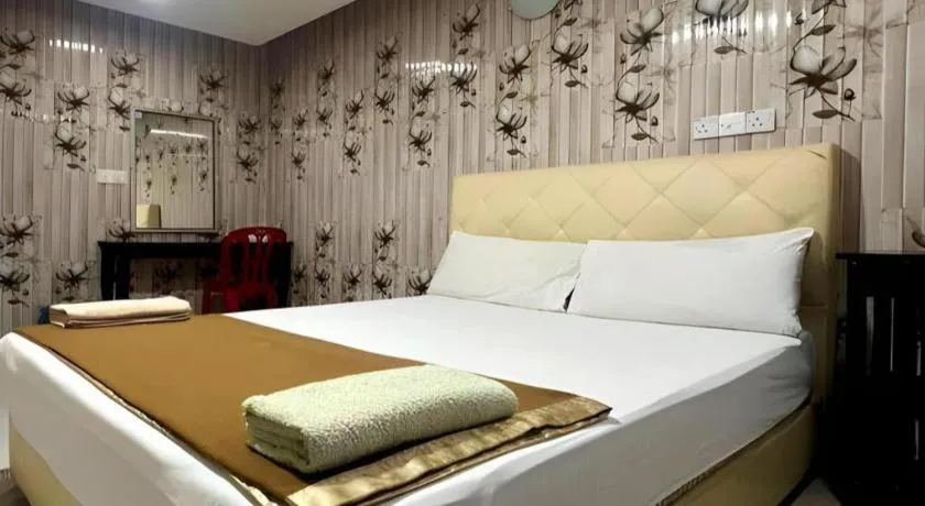 Bed in New Rawang Hotel