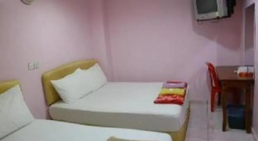 Bed in New Rawang Hotel