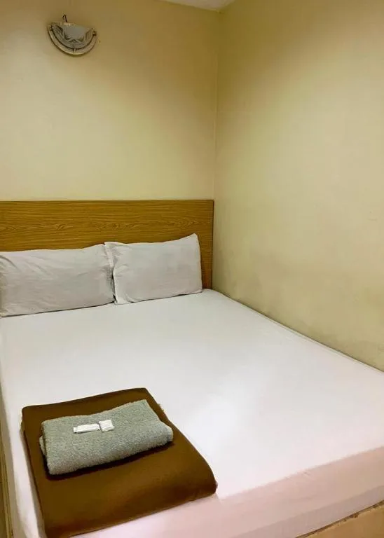 Bed in New Rawang Hotel