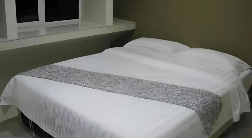 Bed in Hii-5 Hotel