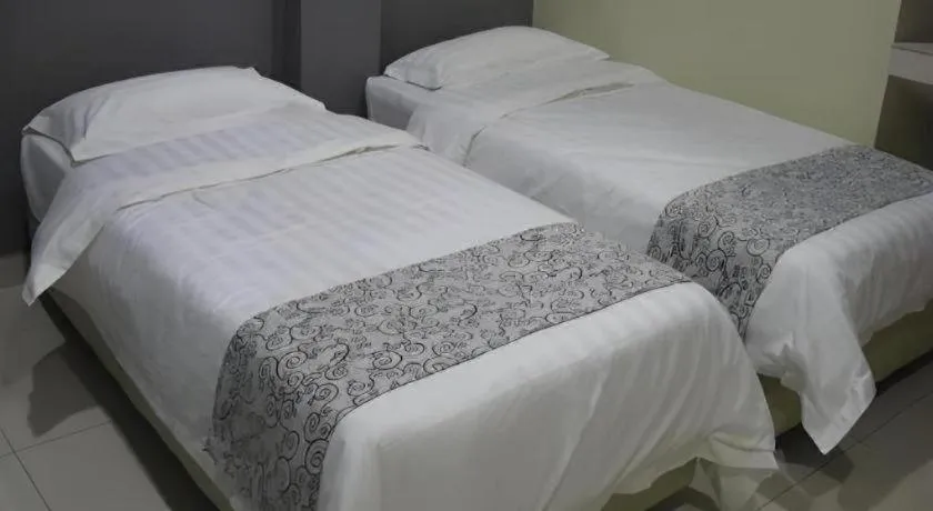 Bed in Hii-5 Hotel