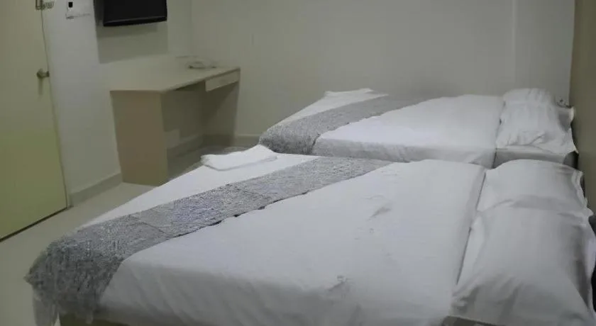 Bed in Hii-5 Hotel