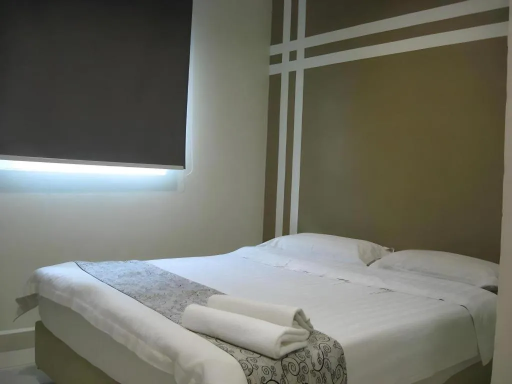 Bed in Hii-5 Hotel