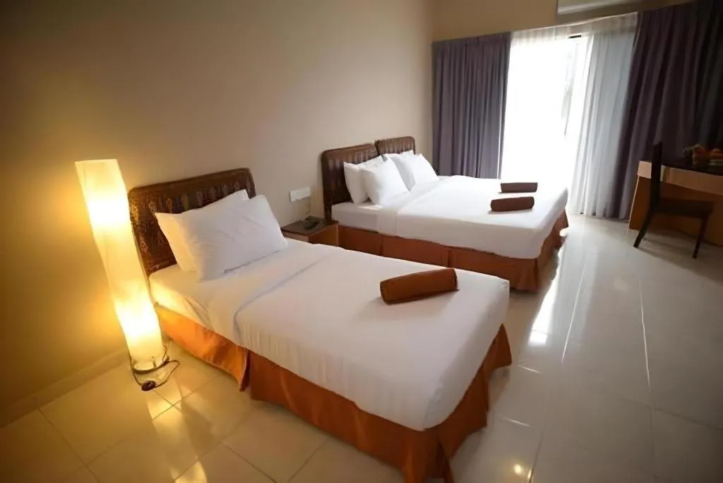 Bed in City Times Hotel