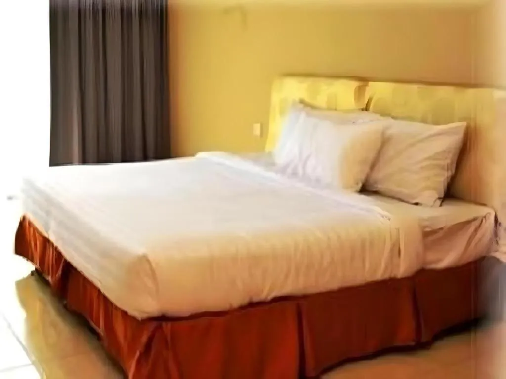 Bed in City Times Hotel