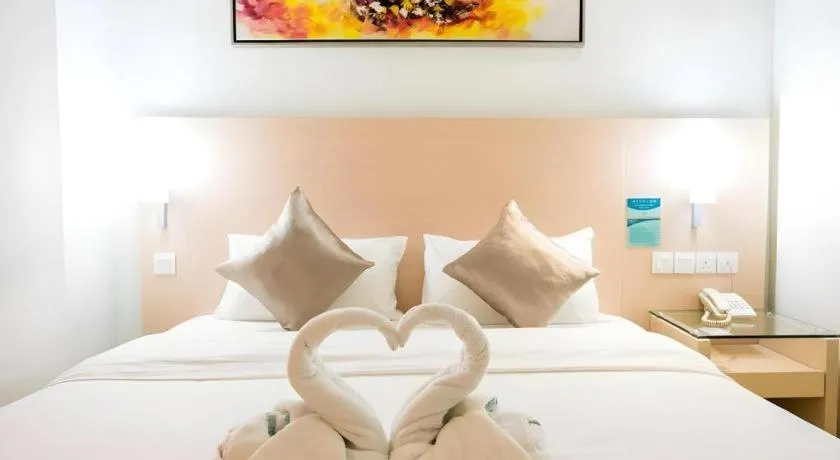 Bed in Hotel City Comfort Inn