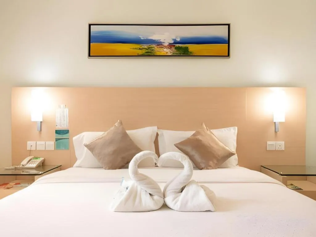 Bed in Hotel City Comfort Inn