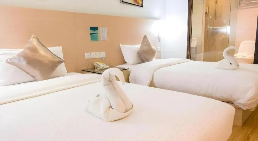 Bed in Hotel City Comfort Inn