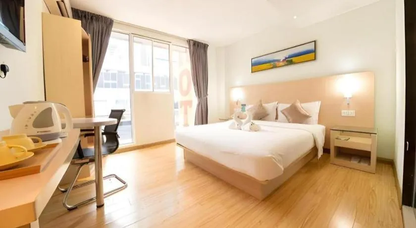 Bed in Hotel City Comfort Inn