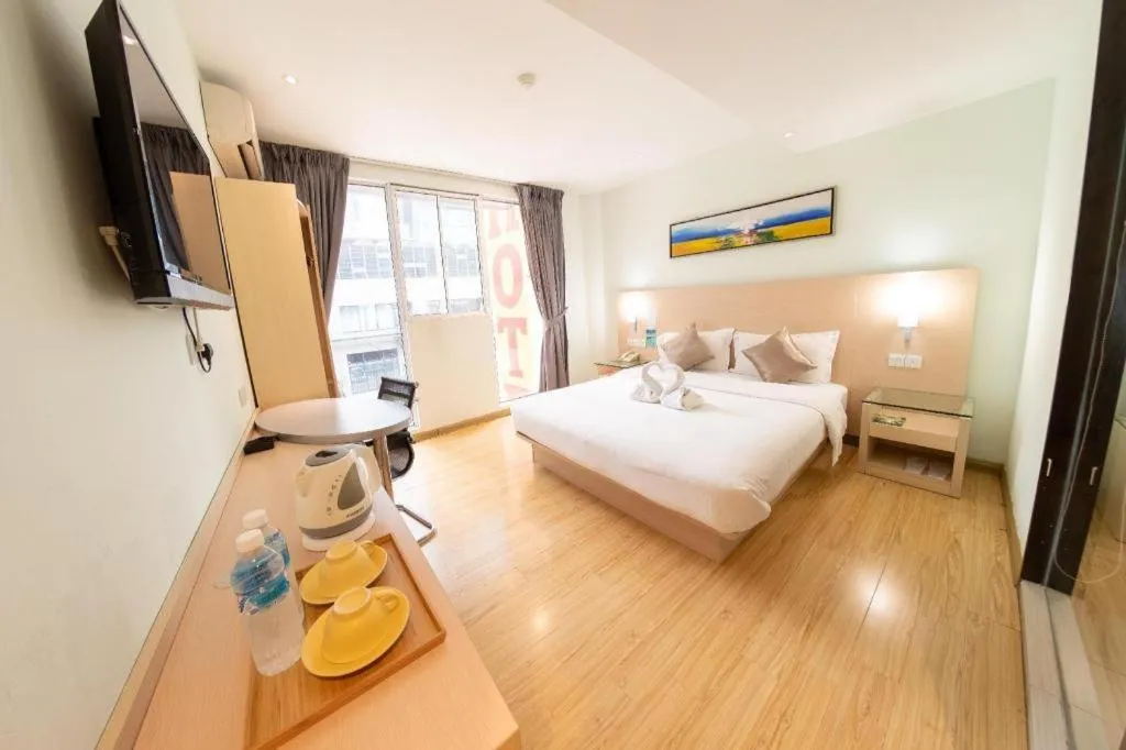 Bed in Hotel City Comfort Inn