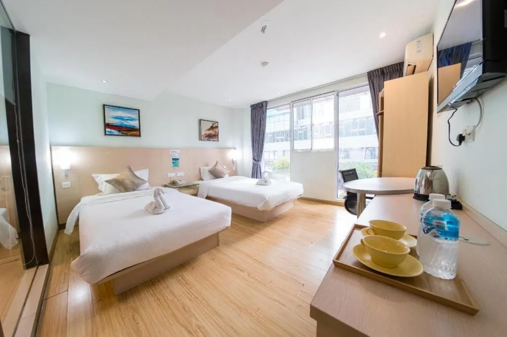 Bed in Hotel City Comfort Inn