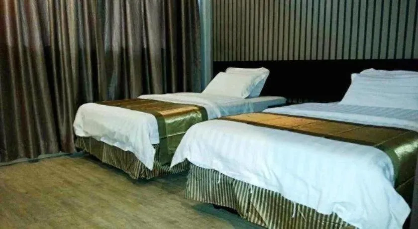 Bed in Goldenhill Hotel