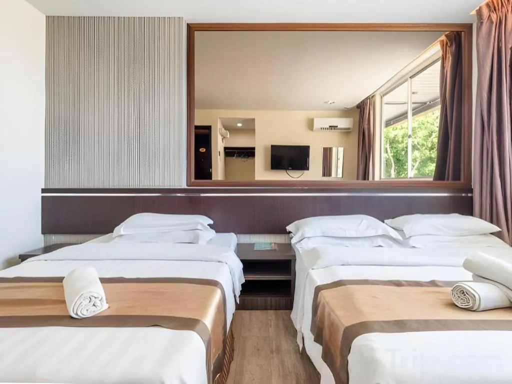 Bed in Goldenhill Hotel