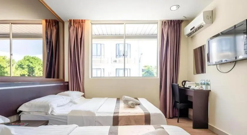 Bed in Goldenhill Hotel