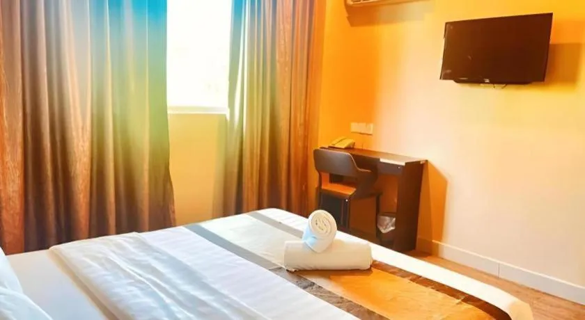 Bed in Goldenhill Hotel