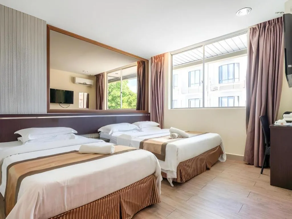 Bed in Goldenhill Hotel