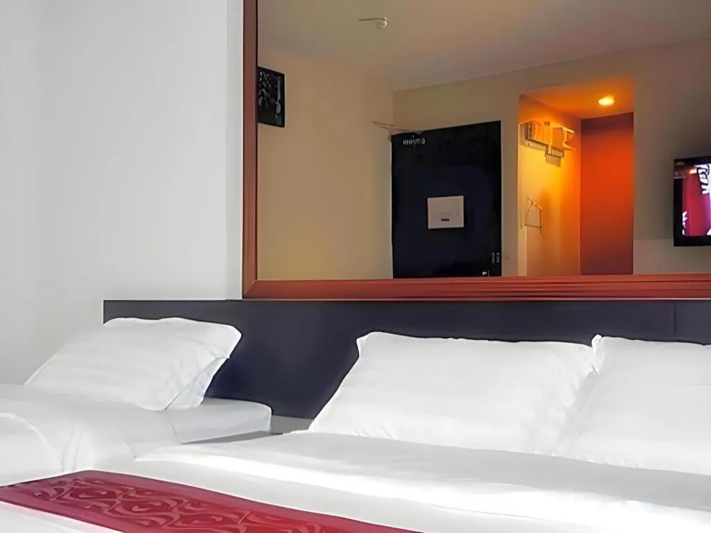 Bed in Goldenhill Hotel