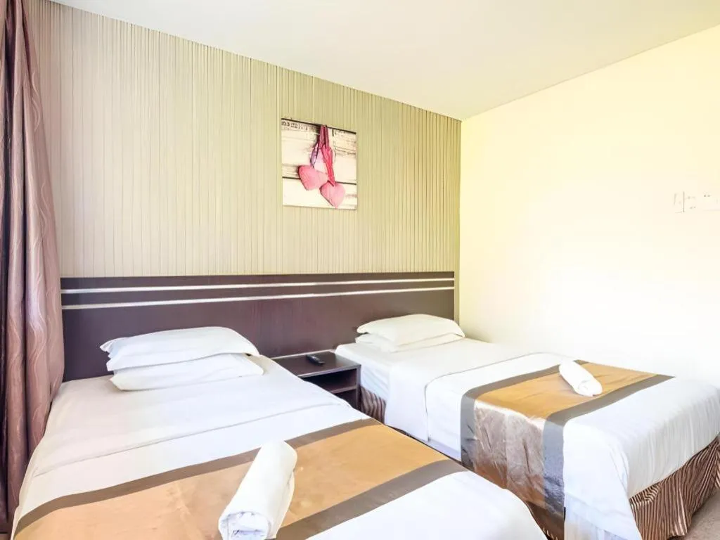 Bed in Goldenhill Hotel