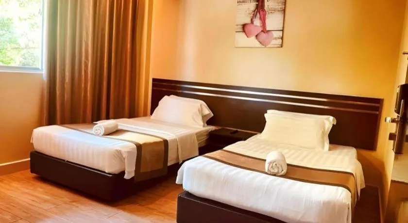 Bed in Goldenhill Hotel