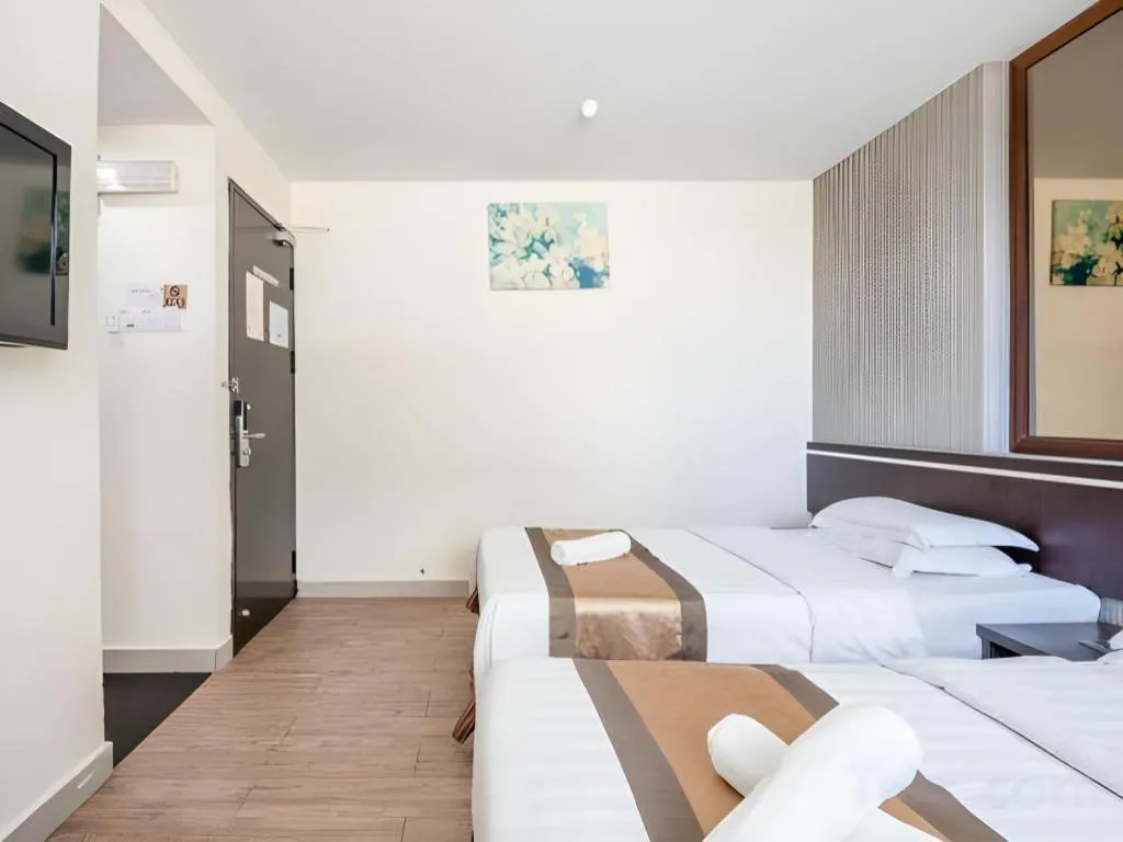 Bed in Goldenhill Hotel