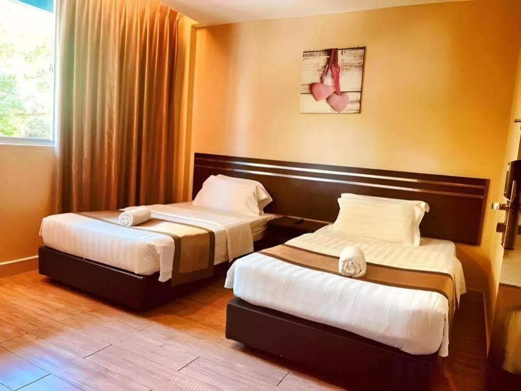 Bed in Goldenhill Hotel