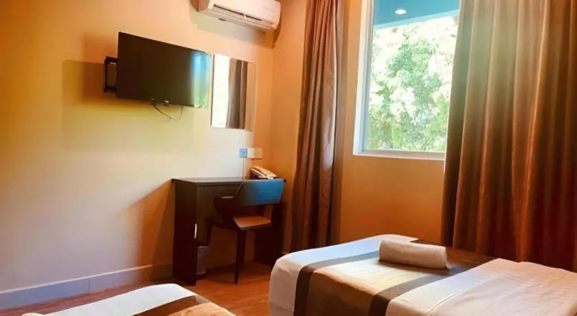 Bed in Goldenhill Hotel