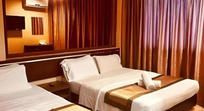 Bed in Goldenhill Hotel