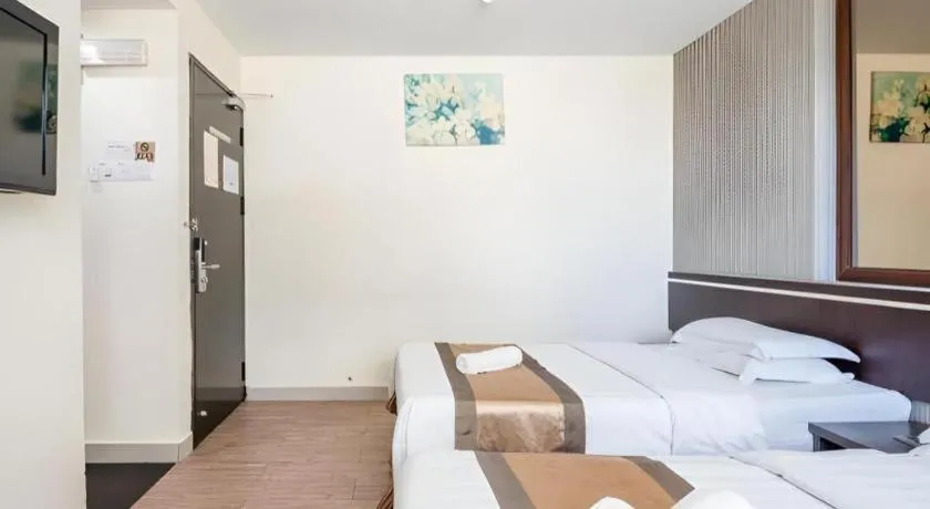 Bed in Goldenhill Hotel