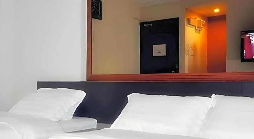 Bed in Goldenhill Hotel