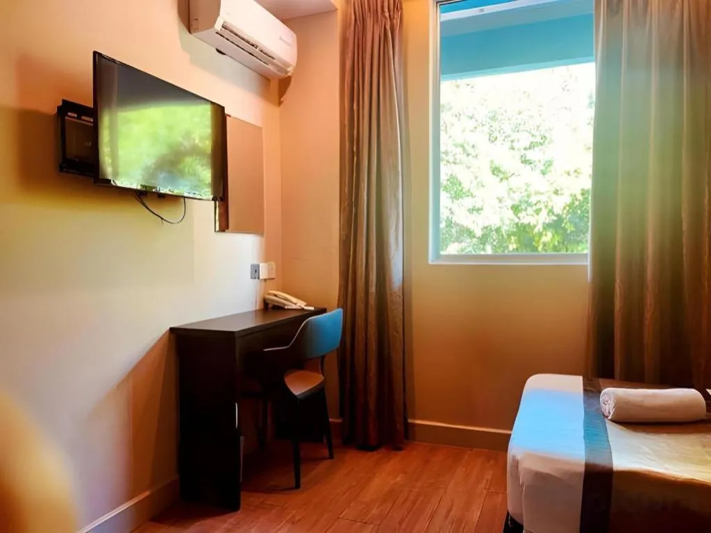 Bed in Goldenhill Hotel