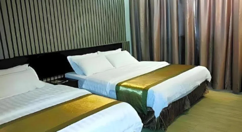 Bed in Goldenhill Hotel