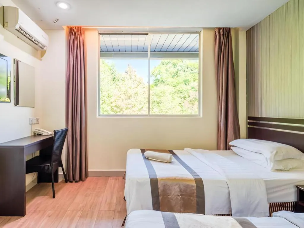 Bed in Goldenhill Hotel