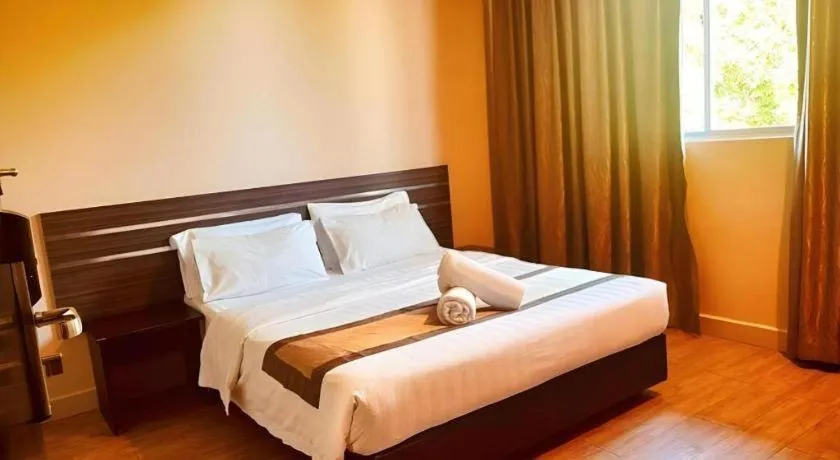 Bed in Goldenhill Hotel