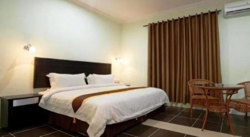 Bed in Han Palace Hotel Semporna