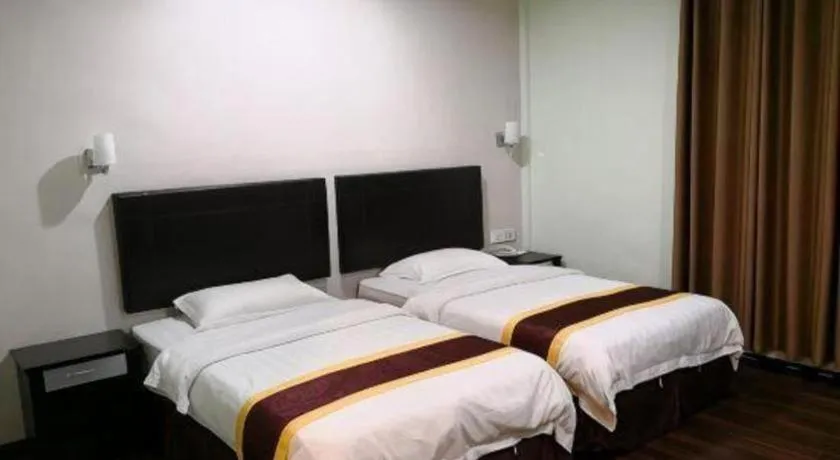 Bed in Han Palace Hotel Semporna