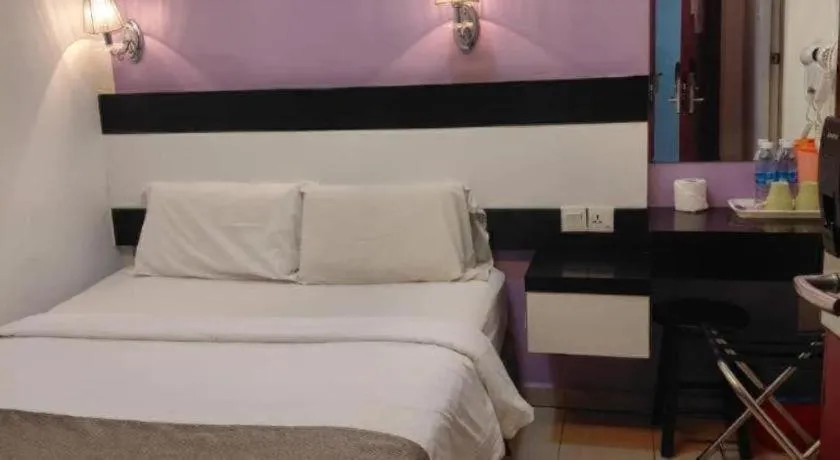 Bed in Hotel Star Moon