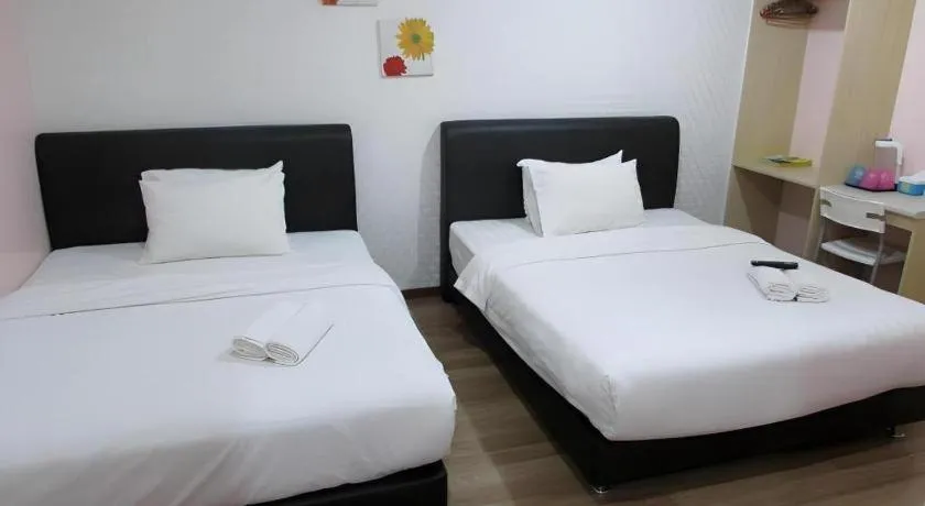 Bed in Hotel Zamburger Sungai Besi
