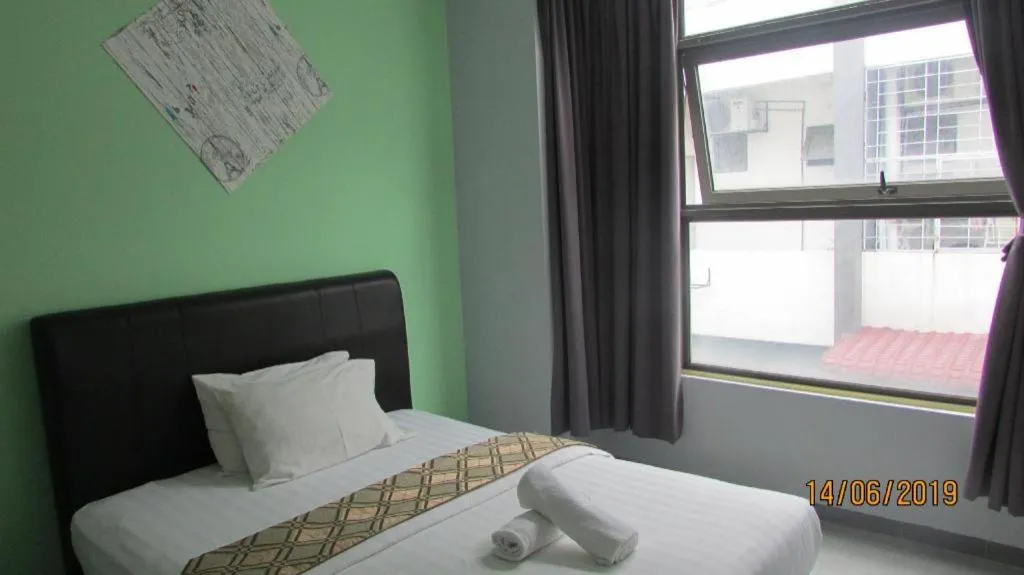 Bed in Hotel Zamburger Sungai Besi