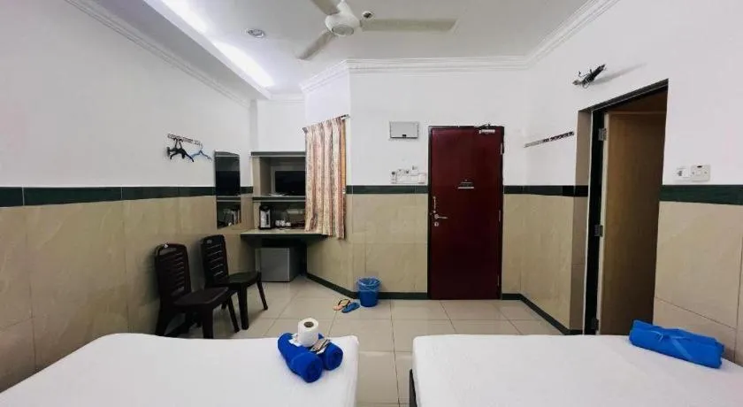 Bed in Burmahtel Hotel