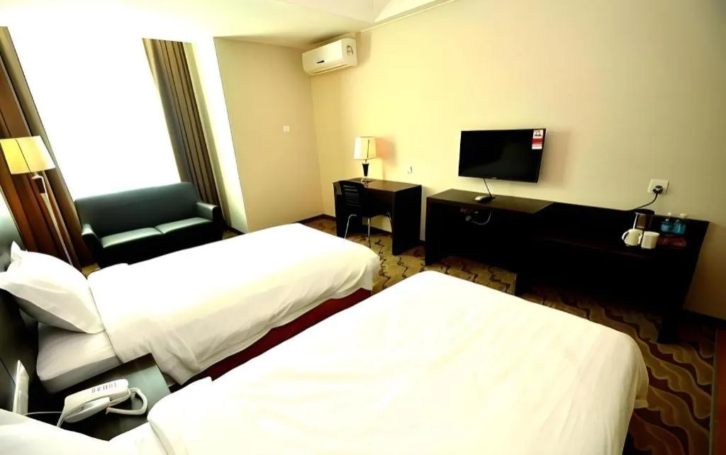 Bed in Eminent Hotel