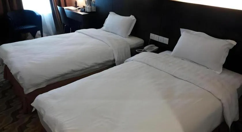 Bed in Eminent Hotel