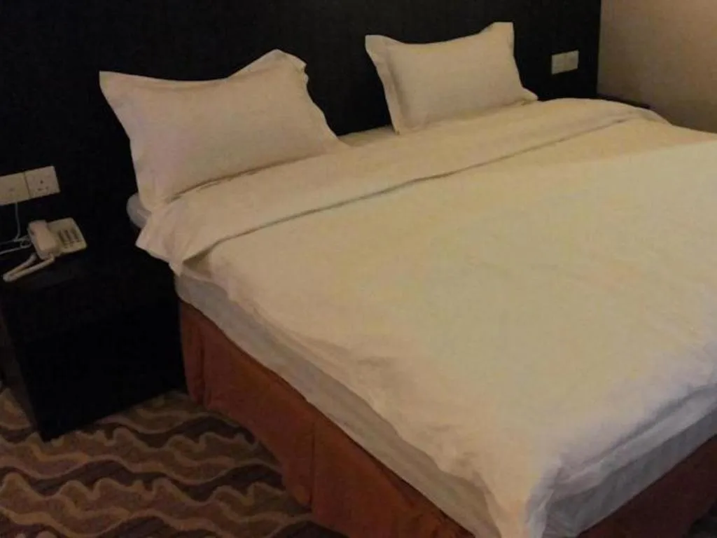 Bed in Eminent Hotel