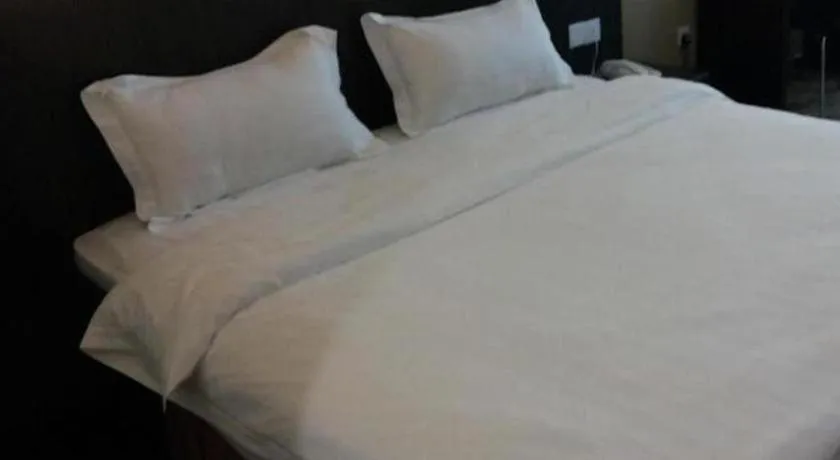 Bed in Eminent Hotel