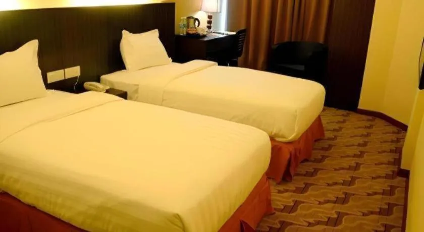 Bed in Eminent Hotel