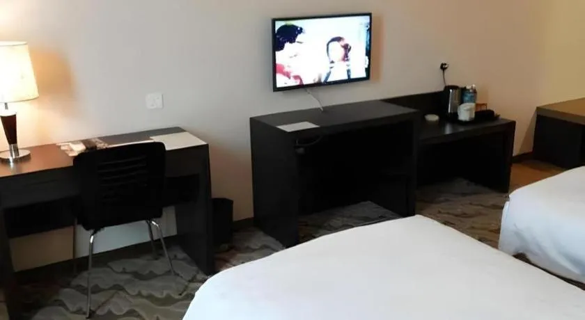 Bed in Eminent Hotel